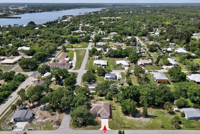 3825 Allen Ave, Micco, FL 32976 - aerial view of property's location with a large body of water and nearby suburban area