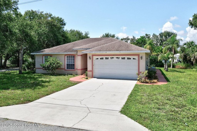 3825 Allen Ave, Micco, FL 32976 - ranch-style house featuring an attached garage, stucco siding, driveway, and a front yard