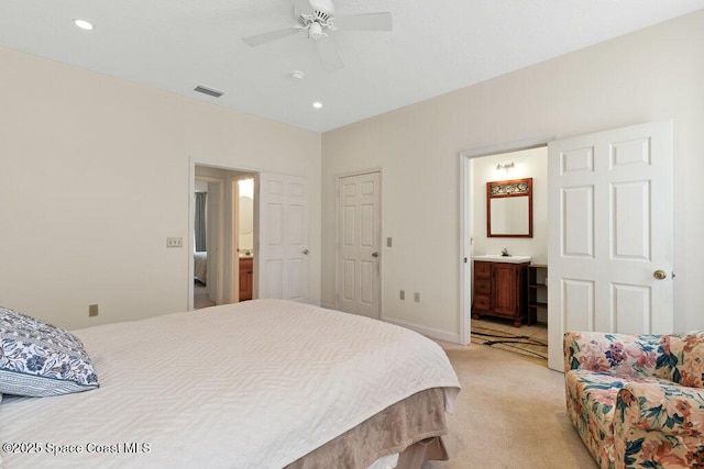3825 Allen Ave, Micco, FL 32976 - bedroom featuring light colored carpet, recessed lighting, ensuite bathroom, and a ceiling fan
