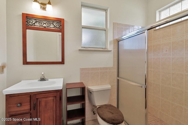 3825 Allen Ave, Micco, FL 32976 - full bath with vanity, a shower stall, and tile walls