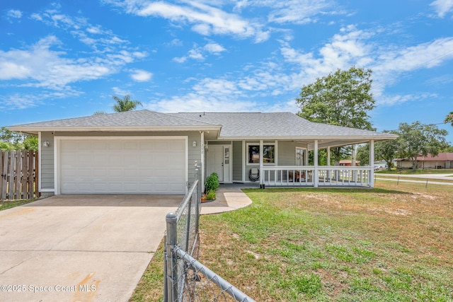 1298 Corning Ave NW, Palm Bay, FL 32907 - view of front facade with a porch, an attached garage, driveway, and a shingled roof