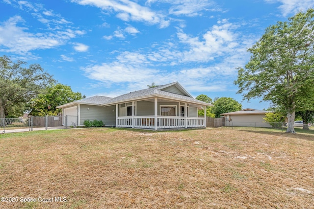 1298 Corning Ave NW, Palm Bay, FL 32907 - view of front facade featuring an attached garage, a porch, and driveway