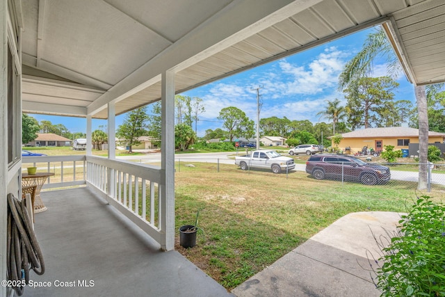 1298 Corning Ave NW, Palm Bay, FL 32907 - view of yard featuring covered porch
