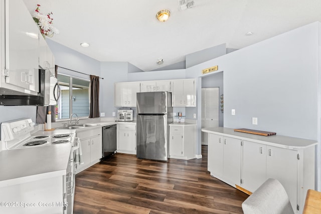 1298 Corning Ave NW, Palm Bay, FL 32907 - kitchen with stainless steel appliances, dark wood-style floors, white cabinetry, light countertops, and lofted ceiling