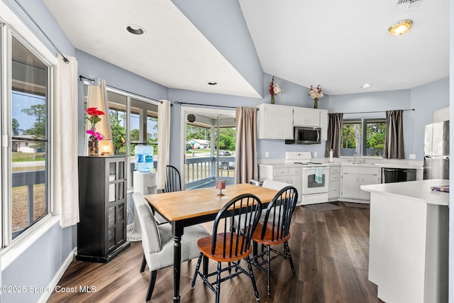 1298 Corning Ave NW, Palm Bay, FL 32907 - dining space featuring dark wood-style flooring and recessed lighting