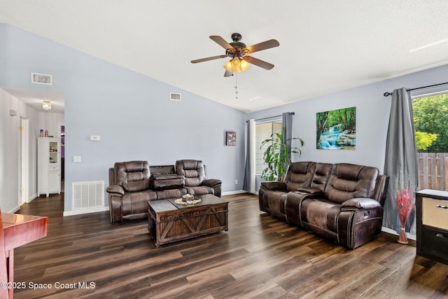 1298 Corning Ave NW, Palm Bay, FL 32907 - living area with vaulted ceiling, wood finished floors, and a ceiling fan