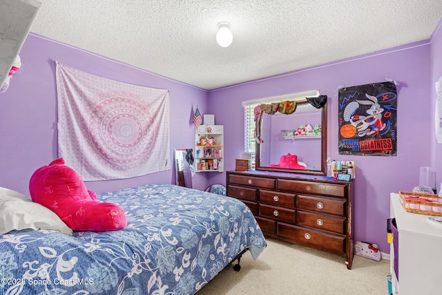 1298 Corning Ave NW, Palm Bay, FL 32907 - carpeted bedroom with a textured ceiling