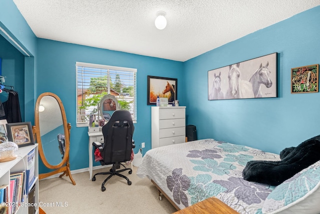 1298 Corning Ave NW, Palm Bay, FL 32907 - carpeted bedroom with a textured ceiling and an office area