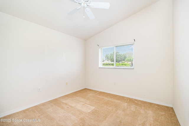 1713 Keys Gate Dr, Melbourne, FL 32940 - empty room with light colored carpet, lofted ceiling, and a ceiling fan