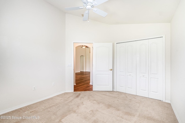1713 Keys Gate Dr, Melbourne, FL 32940 - unfurnished bedroom with lofted ceiling, carpet floors, a closet, and ceiling fan