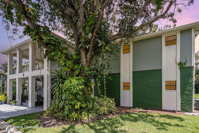 2234 Flower Tree Cir, Melbourne, FL 32935 - view of property exterior featuring stucco siding