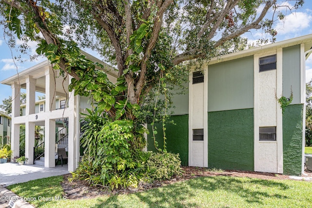 2234 Flower Tree Cir, Melbourne, FL 32935 - view of building exterior with stairs