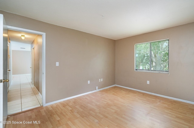 2234 Flower Tree Cir, Melbourne, FL 32935 - spare room with light wood finished floors and baseboards
