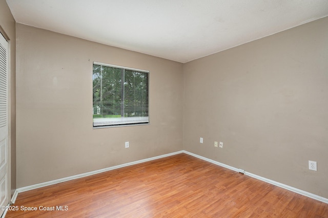2234 Flower Tree Cir, Melbourne, FL 32935 - unfurnished room featuring light wood-style floors and baseboards