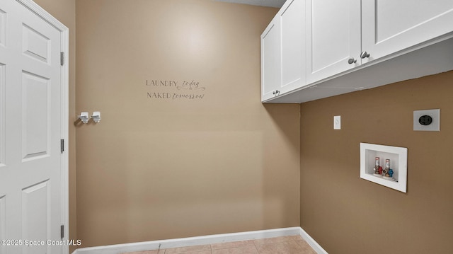 1448 Attilburgh Blvd, West Melbourne, FL 32904 - laundry area with cabinet space, electric dryer hookup, hookup for a washing machine, and light tile patterned floors
