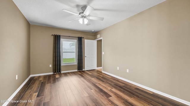 1448 Attilburgh Blvd, West Melbourne, FL 32904 - empty room featuring a ceiling fan and dark wood finished floors