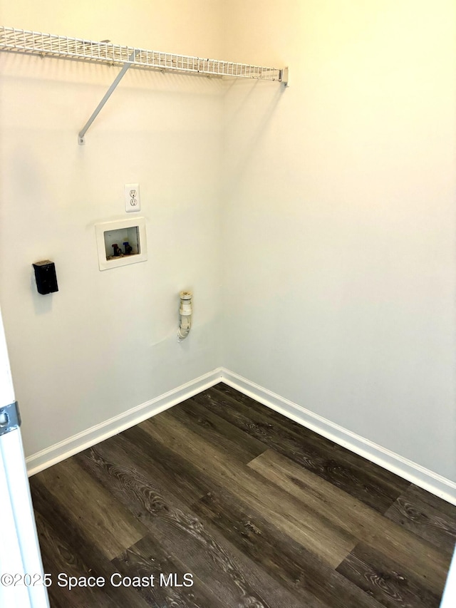 1070 Bella Vista Blvd Unit 110, Saint Augustine, FL 32084 - washroom with dark wood-type flooring and washer hookup