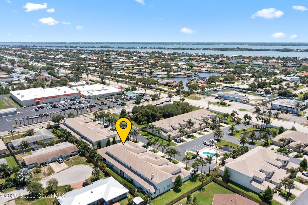 612 Mar Brisa Ct, Satellite Beach, FL 32937 - aerial perspective of suburban area featuring a large body of water