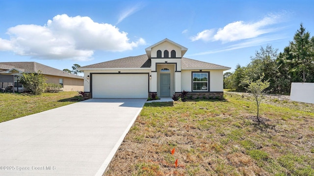 298 Trilby Rd SW, Palm Bay, FL 32908 - view of front of home featuring stucco siding, an attached garage, concrete driveway, a front yard, and stone siding