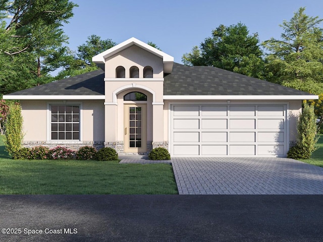 298 Trilby Rd SW, Palm Bay, FL 32908 - view of front of house featuring stucco siding, decorative driveway, stone siding, and an attached garage