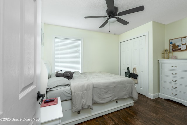 1249 Coosa Ave NE, Palm Bay, FL 32907 - bedroom with dark wood finished floors, a closet, and a ceiling fan