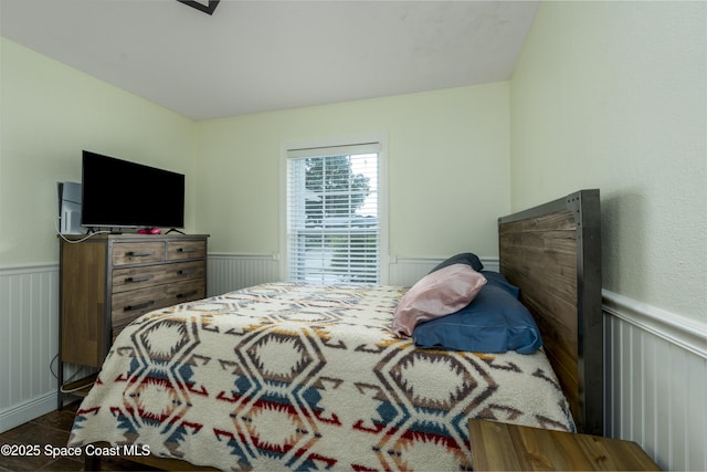 1249 Coosa Ave NE, Palm Bay, FL 32907 - bedroom featuring a wainscoted wall