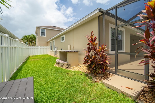 1026 Shiloh Dr, Melbourne, FL 32940 - fenced backyard with a lanai and a patio