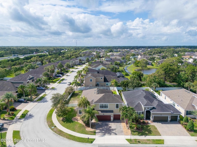 1026 Shiloh Dr, Melbourne, FL 32940 - aerial perspective of suburban area featuring a large body of water