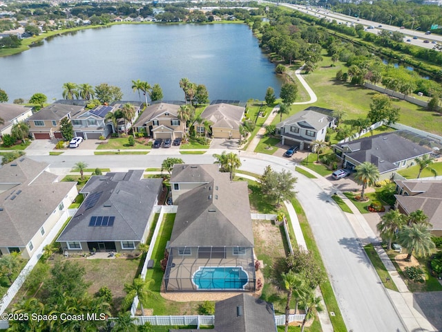 1026 Shiloh Dr, Melbourne, FL 32940 - aerial view of residential area with a large body of water and a pool