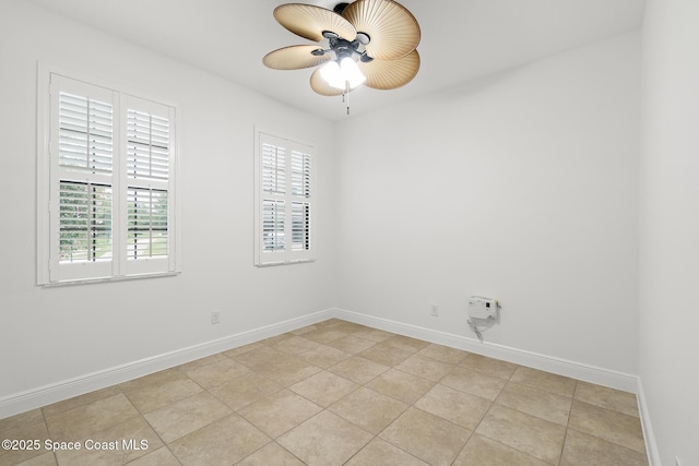 1026 Shiloh Dr, Melbourne, FL 32940 - empty room with a ceiling fan and light tile patterned floors