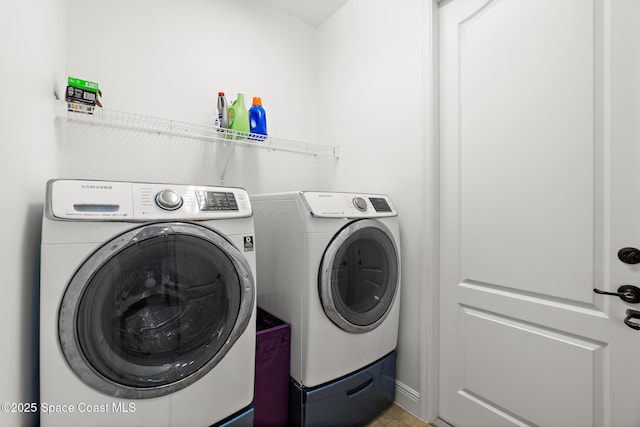 1026 Shiloh Dr, Melbourne, FL 32940 - washroom with washing machine and dryer