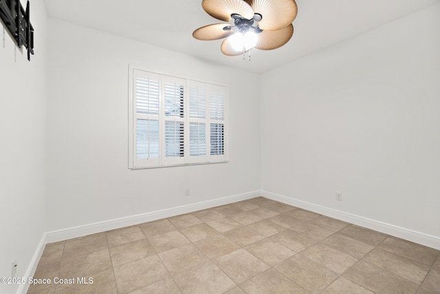 1026 Shiloh Dr, Melbourne, FL 32940 - spare room featuring a ceiling fan and baseboards