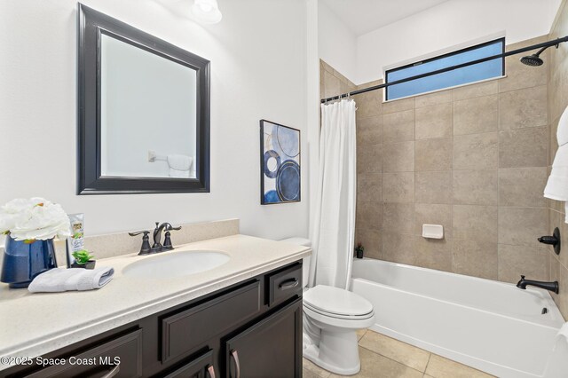 1026 Shiloh Dr, Melbourne, FL 32940 - bathroom featuring vanity, shower / bath combo, and tile patterned floors