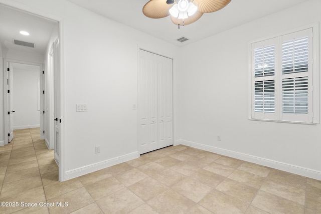 1026 Shiloh Dr, Melbourne, FL 32940 - unfurnished bedroom with a closet and a ceiling fan