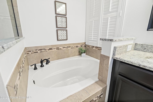 1026 Shiloh Dr, Melbourne, FL 32940 - full bathroom with a garden tub and vanity