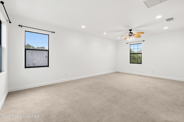 1026 Shiloh Dr, Melbourne, FL 32940 - empty room with recessed lighting, ceiling fan, and light colored carpet