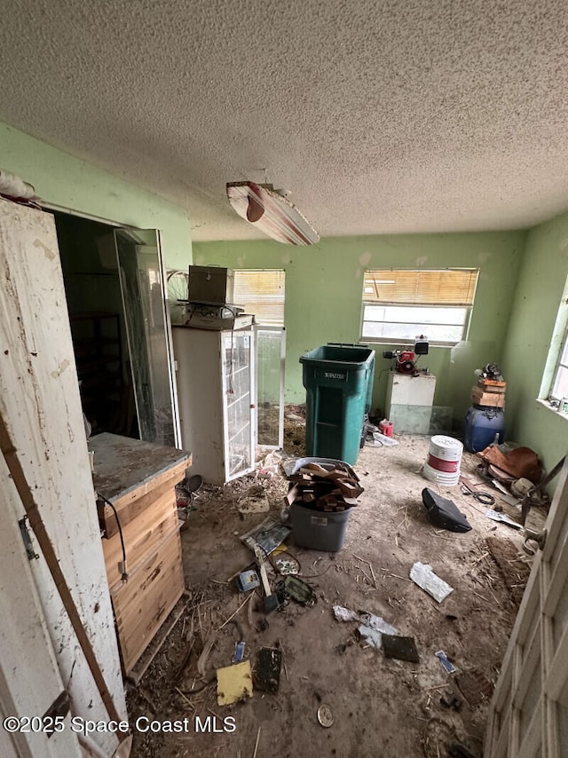 2793 N Breeze Rd, Melbourne, FL 32935 - misc room with plenty of natural light and a textured ceiling