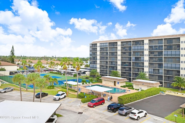 520 Palm Springs Blvd Unit 405, Indian Harbour Beach, FL 32937 - view of apartment building / complex featuring uncovered parking