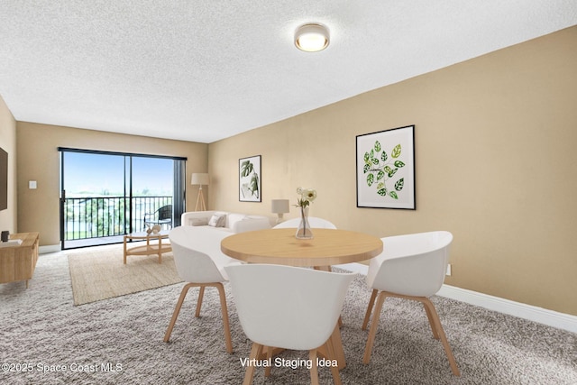 520 Palm Springs Blvd Unit 405, Indian Harbour Beach, FL 32937 - carpeted dining room with a textured ceiling and baseboards