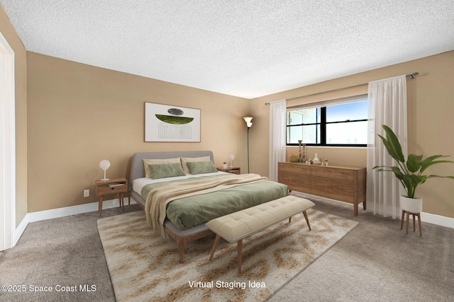520 Palm Springs Blvd Unit 405, Indian Harbour Beach, FL 32937 - bedroom featuring carpet floors and a textured ceiling