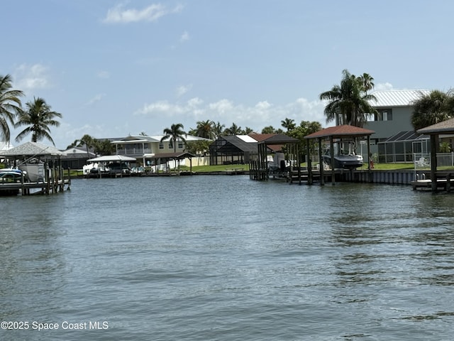 55 Country Club Rd, Cocoa Beach, FL 32931 - water view with a boat dock and boat lift