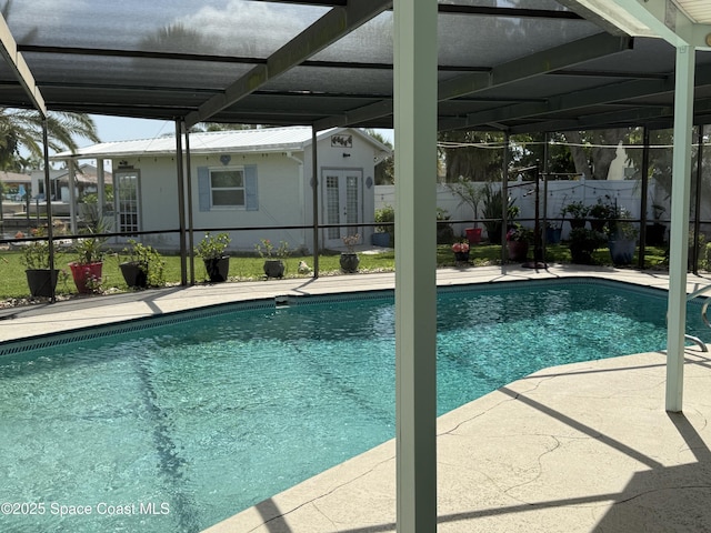 55 Country Club Rd, Cocoa Beach, FL 32931 - view of pool featuring a patio, glass enclosure, and french doors