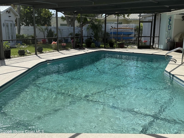55 Country Club Rd, Cocoa Beach, FL 32931 - view of swimming pool with a patio and glass enclosure