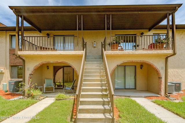 128 San Paulo Cir Unit 128, West Melbourne, FL 32904 - view of property featuring stairs