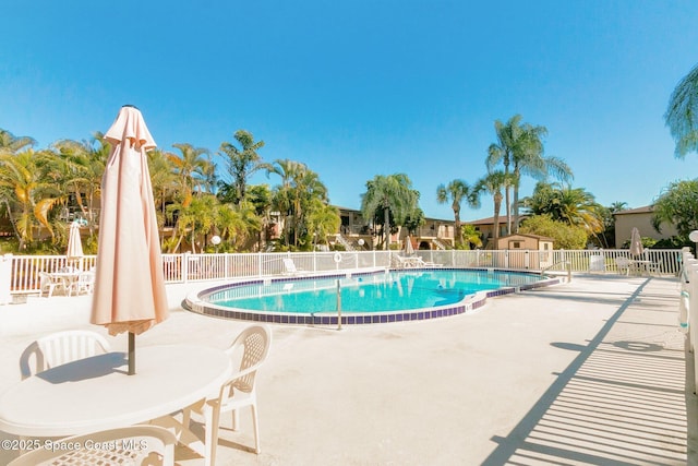 128 San Paulo Cir Unit 128, West Melbourne, FL 32904 - community pool featuring a patio