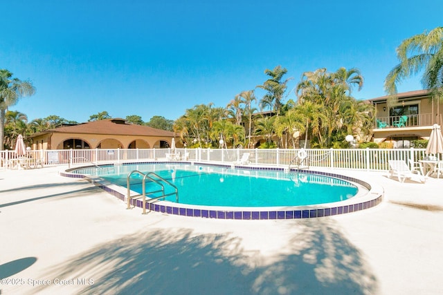 128 San Paulo Cir Unit 128, West Melbourne, FL 32904 - community pool with a patio area