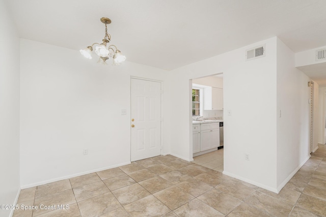2219 Flower Tree Cir, Melbourne, FL 32935 - unfurnished room with a chandelier and baseboards