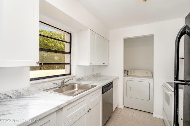 2219 Flower Tree Cir, Melbourne, FL 32935 - kitchen featuring washer / clothes dryer, dishwasher, white cabinets, and light tile patterned floors