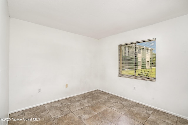 2219 Flower Tree Cir, Melbourne, FL 32935 - spare room with baseboards