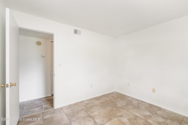 2219 Flower Tree Cir, Melbourne, FL 32935 - spare room featuring baseboards